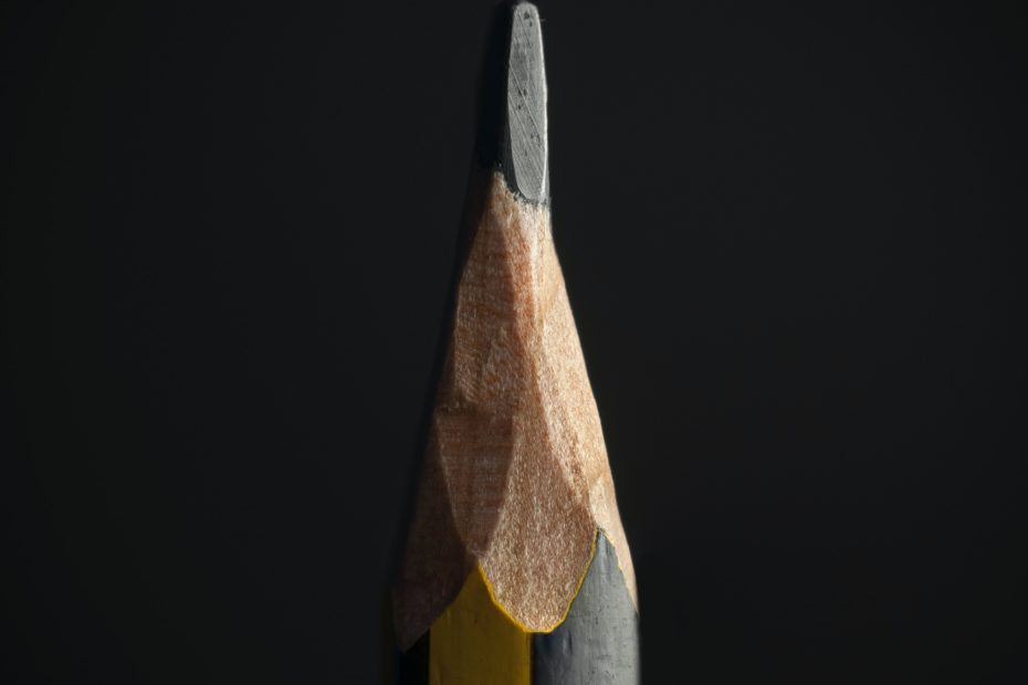 black pencil on black background